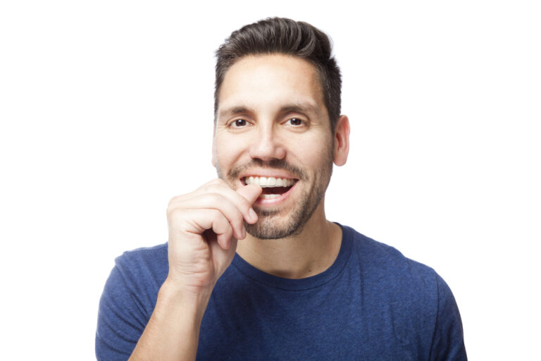 A Man wearing clear braces